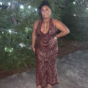 Here is a beautiful prom dress from jump apparel. She is a size 9/10.